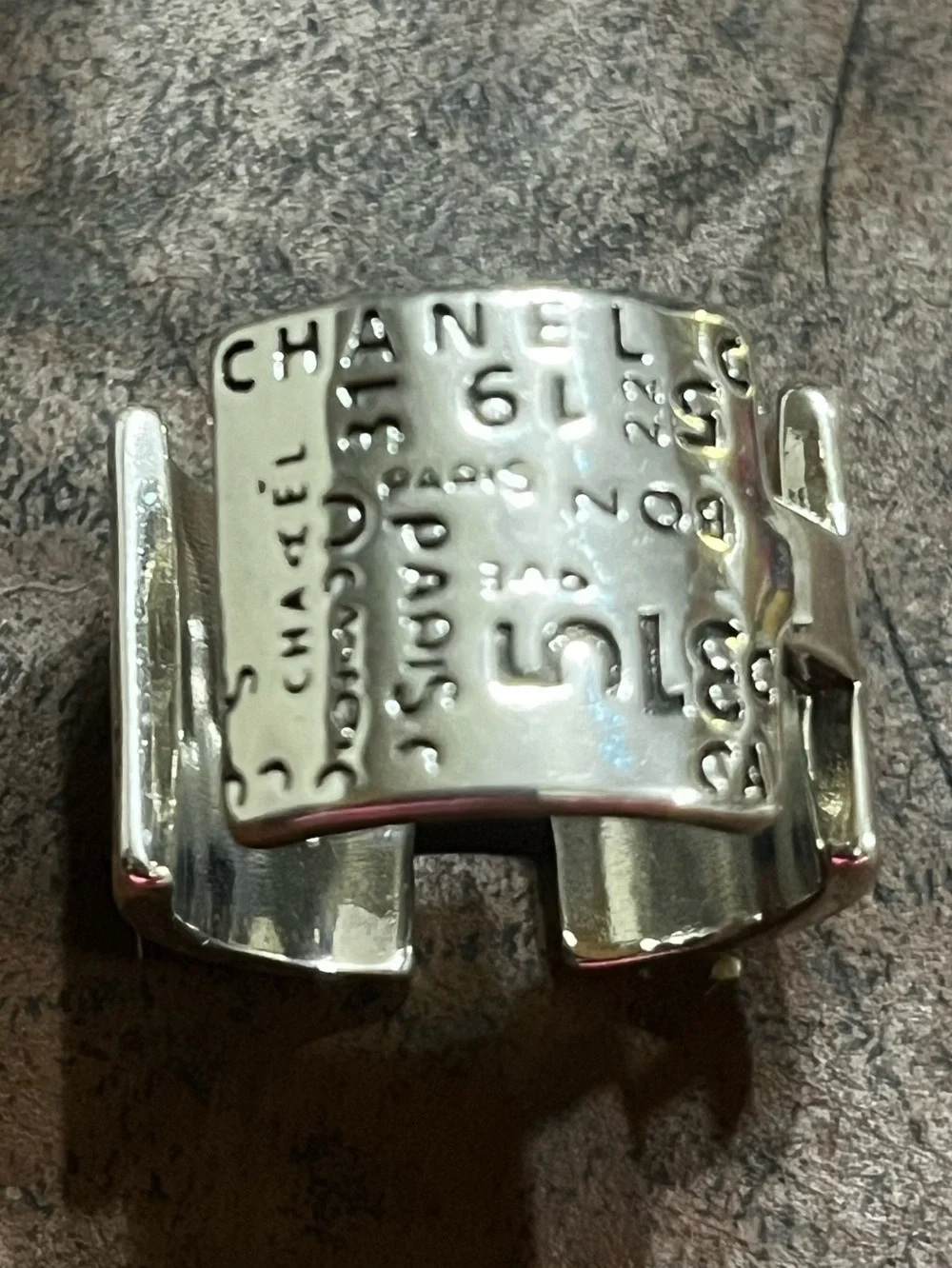 CHANEL Silver Cuff Ring with Embossed Logo